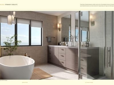 Brightside at River’s Edge primary ensuite featuring freestanding tub, double vanity, and large windows with natural stone finishes